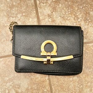 Authentic Salvatore Ferragamo Small Black Leather Pouch With Hinged Clasp